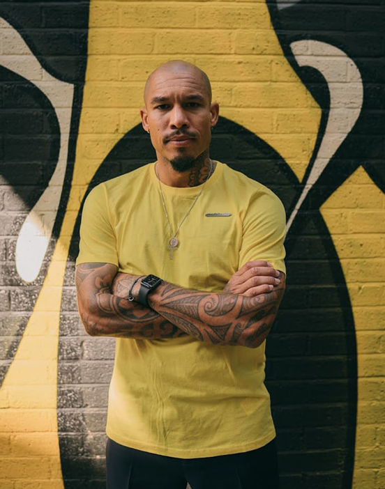 The yellow mdcr mark on the Manchester City collaboration shirt