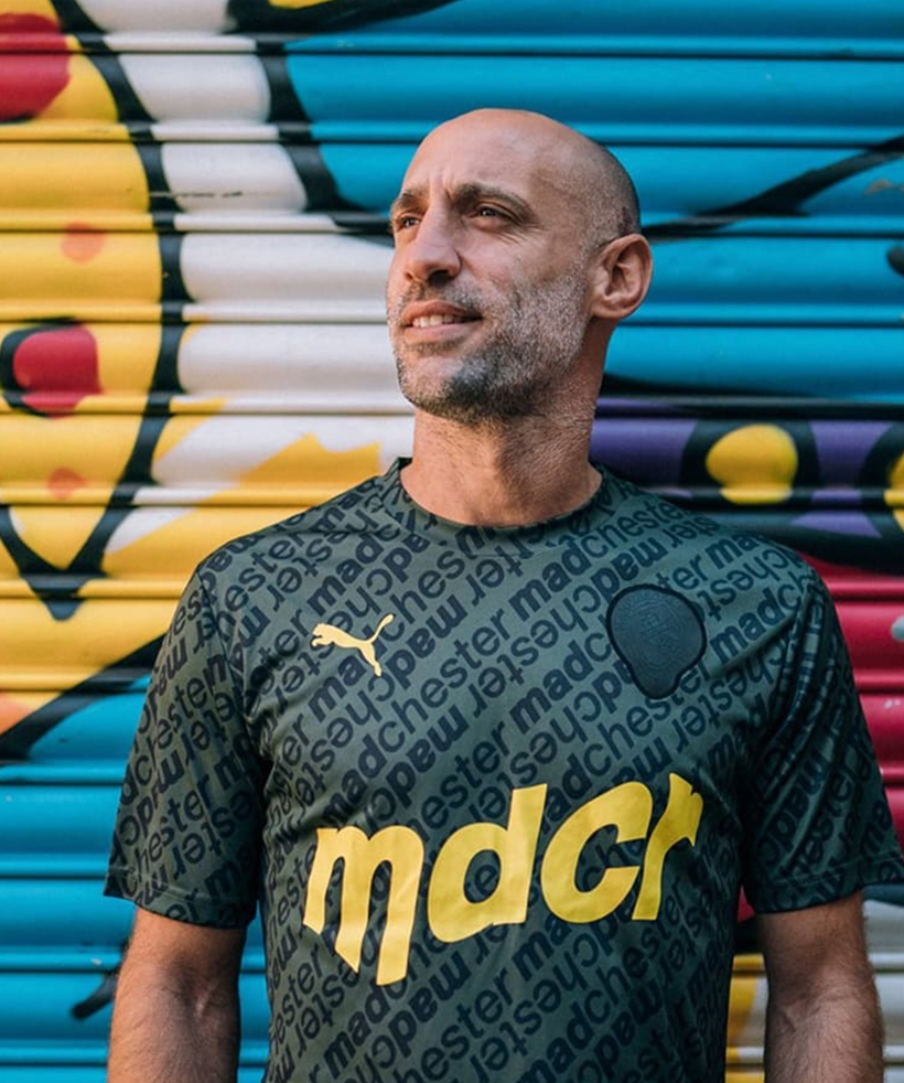 Pablo Zabaleta in the yellow mdcr Manchester City shirt